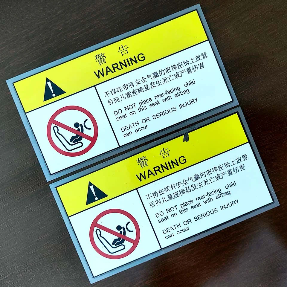 Self-adhesive warning labels
